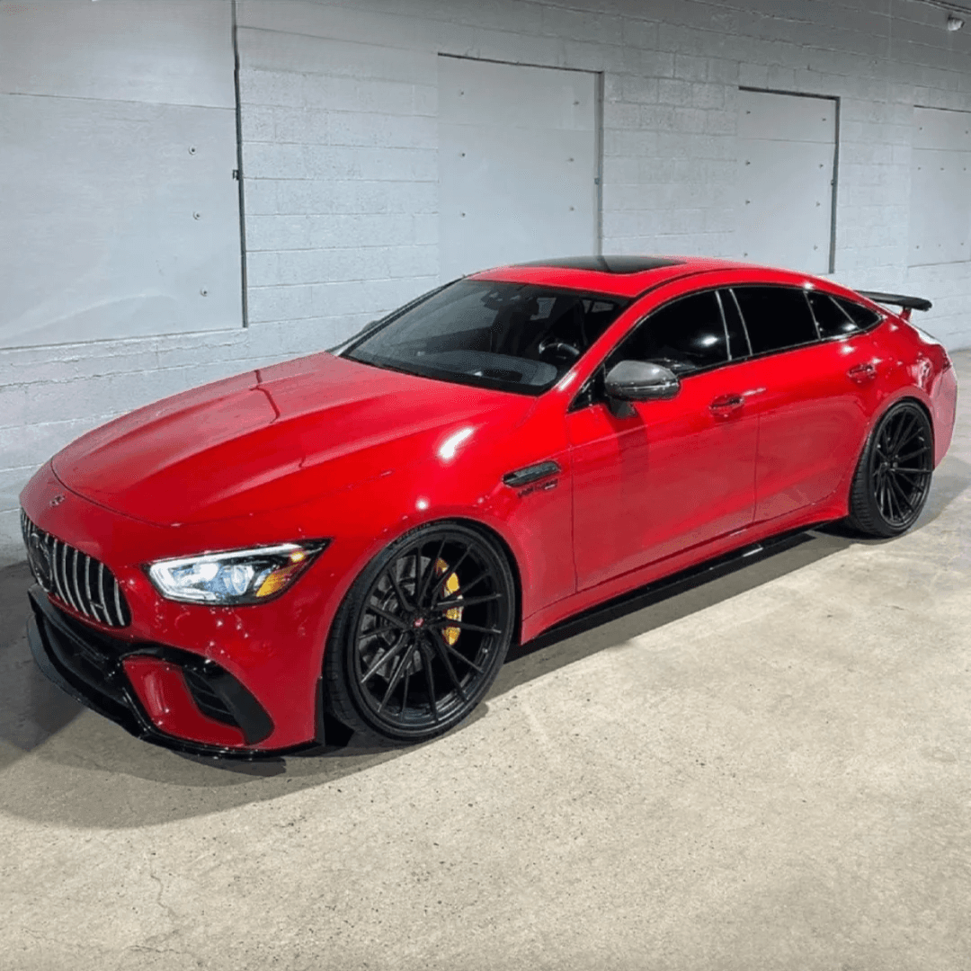 Super Gloss Ferrari Red Vinyl Wrap on car